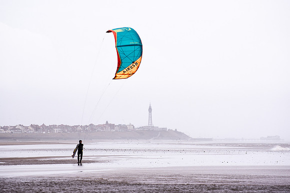 Kite surfer returns home at Blackpool, lancashire.