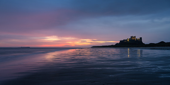 Bamburgh castle at dawn