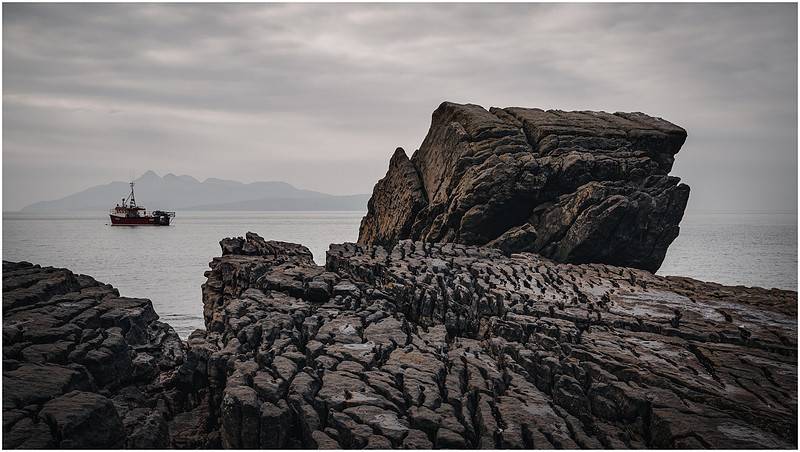 The ”Hulk” of a giant keeps watch over Rùm at Elgol, Isle of Skye.