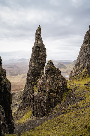Needle like rocks stand tall high up above the Quiraing on the Isle of Skye