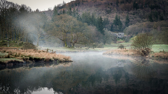 Misty sunrise at River Brathay in Cumbria