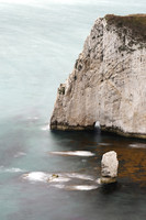 Towering view of a sea sack at bats head chalk cliffs  from Swyre Head in Dorset.