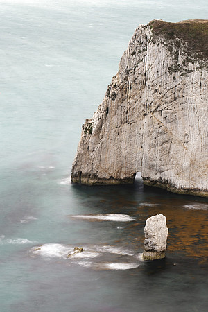 Towering view of a sea sack at bats head chalk cliffs  from Swyre Head in Dorset.