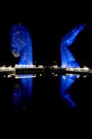 Night time with blue lights at The Kelpies, Falkirk, Scotland.
