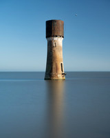 Long exposure image of water tower in the sea at Spurn point.
