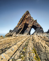 Blue skies at Blackchurch Rock in Devon.