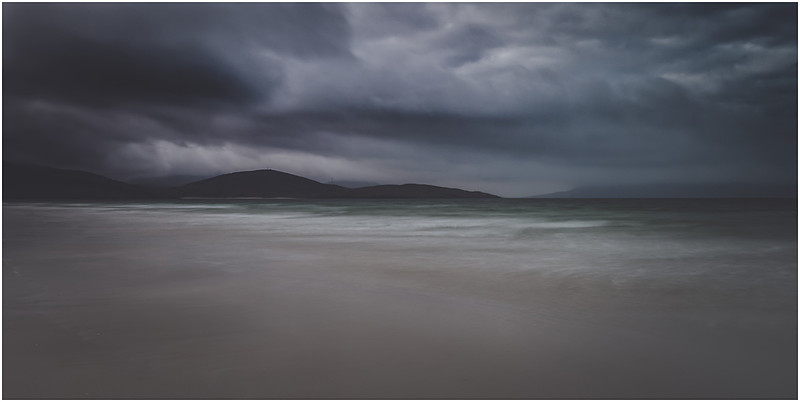 Remarkably dry storm clouds passing over Harris, on Luskentyre beach, Isle of Harris, Scotland