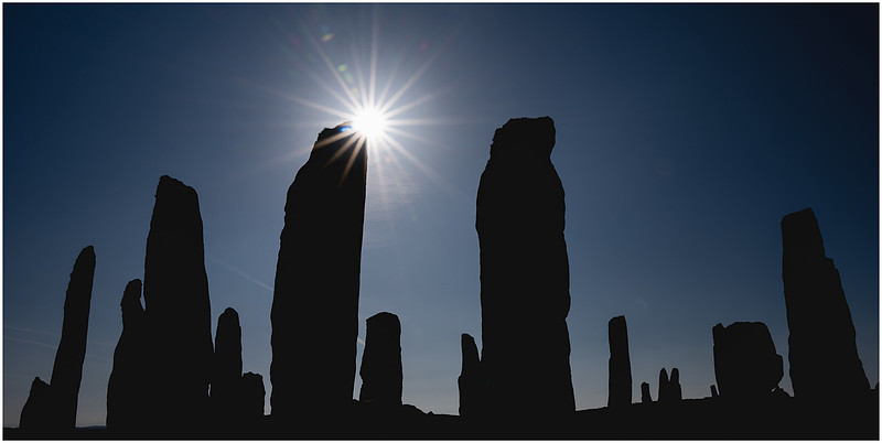 The sun and the stones, Calanais Standing Stones, Isle of Lewis, Scotland.