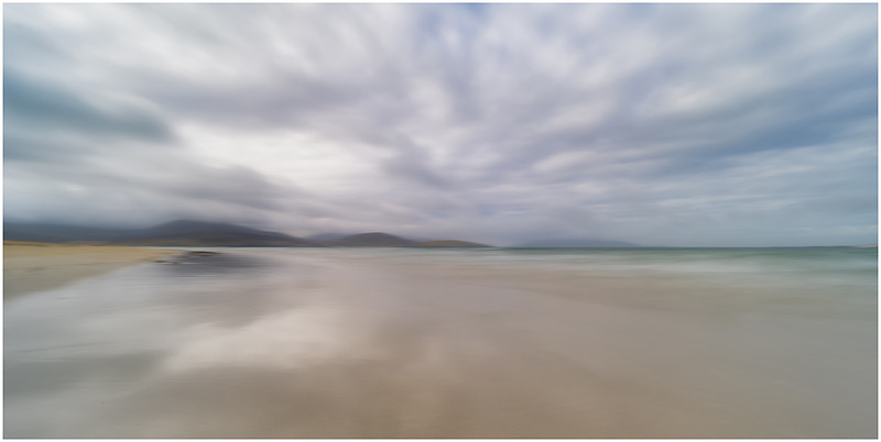 Big skies and clouds reflecting on Luskentyre beach, Isle of Harris, Scotland