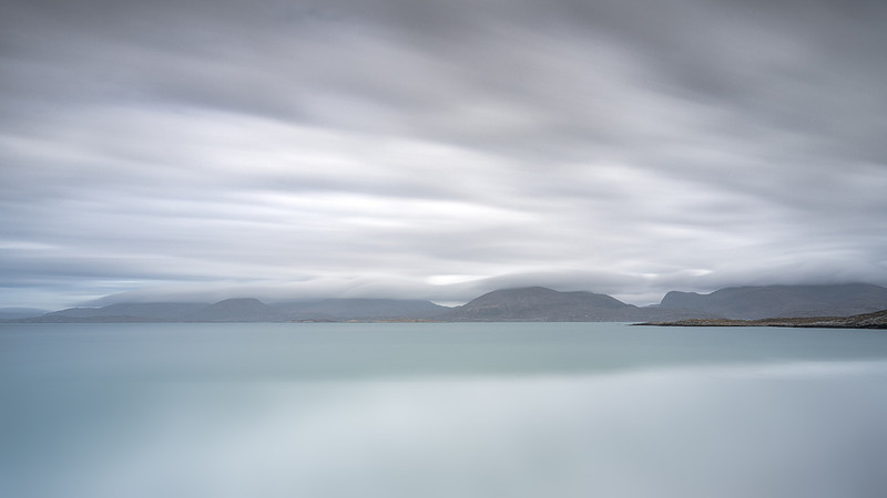The movement of sky and sea over the mountains on Luskentyre beach, Isle of Harris, Scotland.