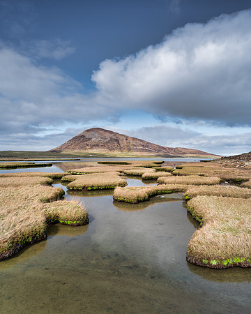 The weathered shoreline of Elgol has many interesting geological features.